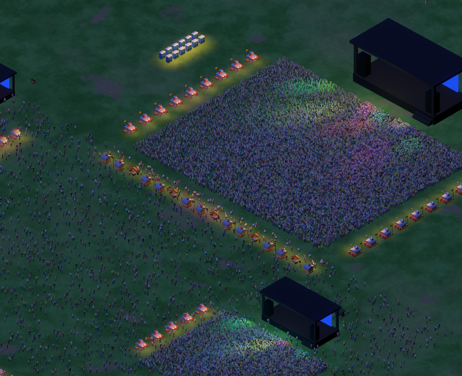 A night-time festival seen from above: thousands of visitors around three stages, rows of lit food stalls and toilets.
